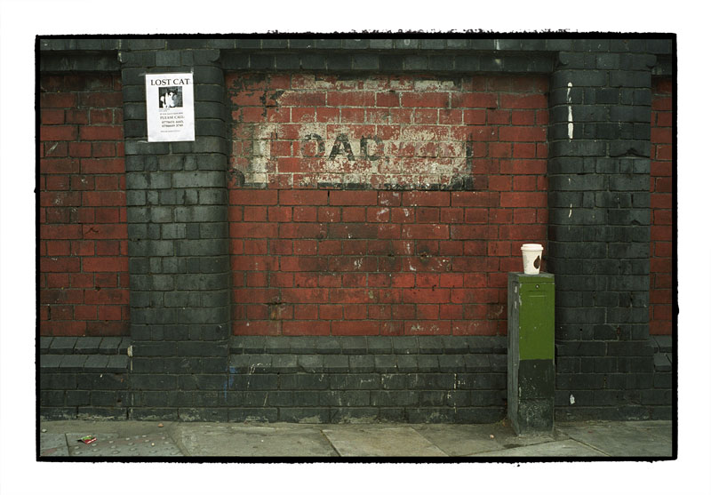 Lost cat sign and discarded paper cup, London, 2006