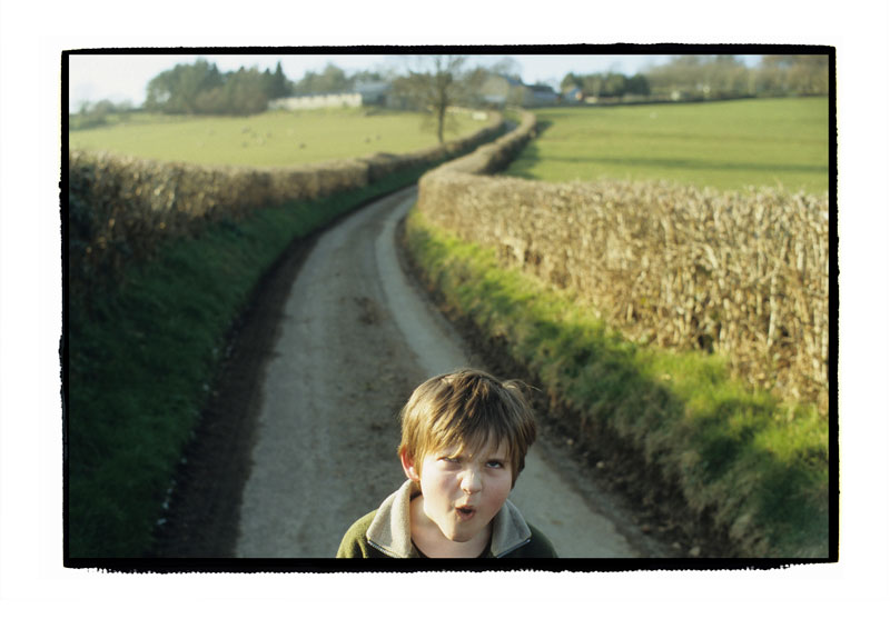 A son not wanting to have his picture taken, Radnorshire, 2004.