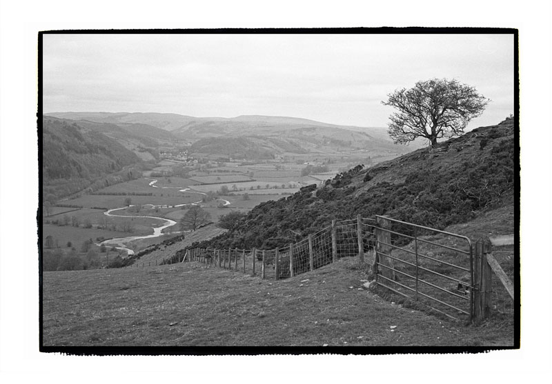 Offa's Dyke path North of Knighton, Knucklas castellated railway bridge in far distance.